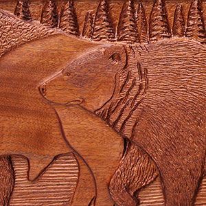 Carving detail featuring a bear.