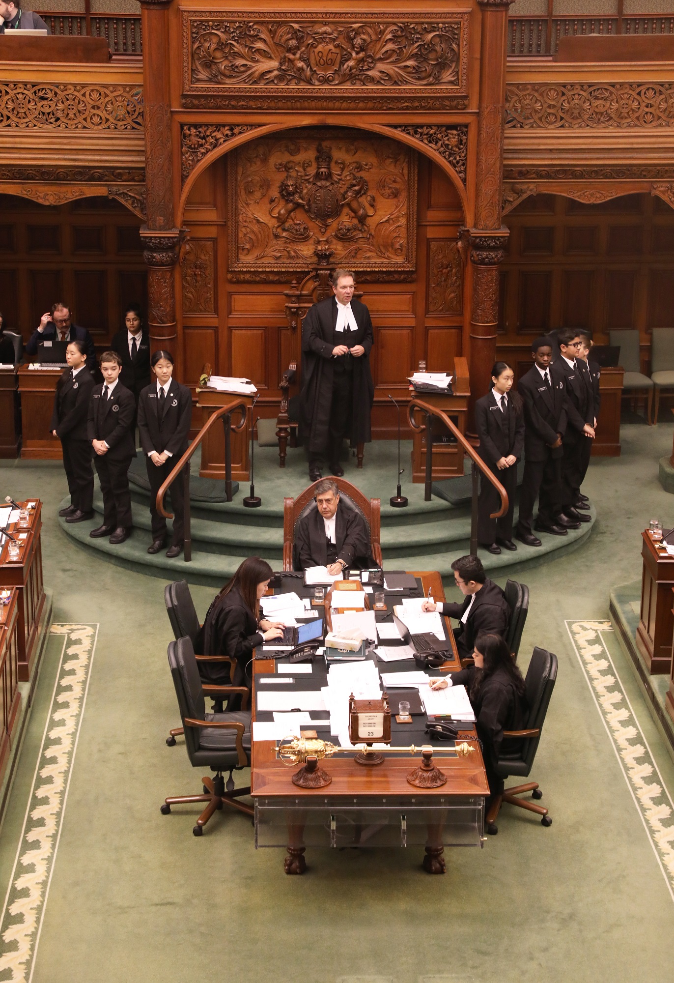 Picture of the Speaker, Pages and Clerks in the Chamber