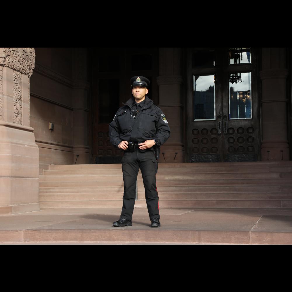 Peace Officer in front of the Legislature