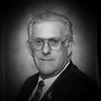 A headshot of E.J. Douglas Rollins