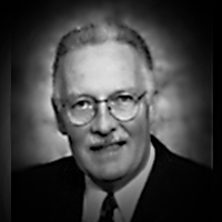 A headshot of Gary L. Leadston