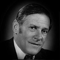 A headshot of Vernon Milton Singer