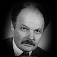 A headshot of Jan Dukszta