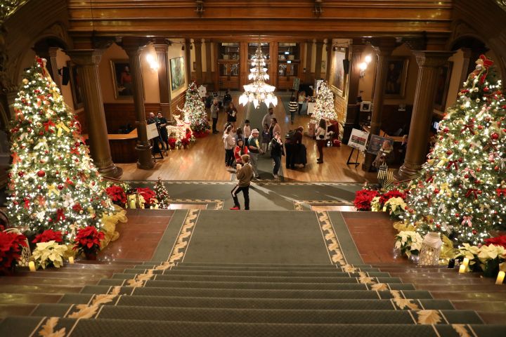 The Legislative Building staircase with Christmas trees on either side