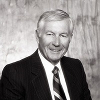 A headshot of William J. Saunderson