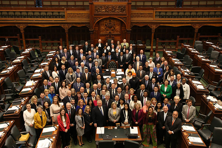 large group of MPPs inside the Chamber