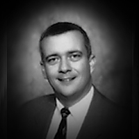 A headshot of Dan Newman