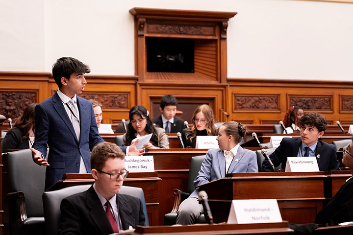 Students participating in Model Parliament inside the legislative Chamber 
