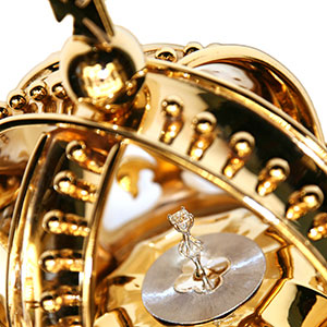 Detail of two diamonds in the Mace on a white background.
