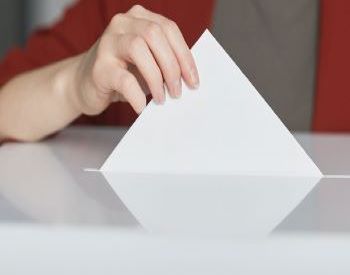 Casting a vote in a ballot box