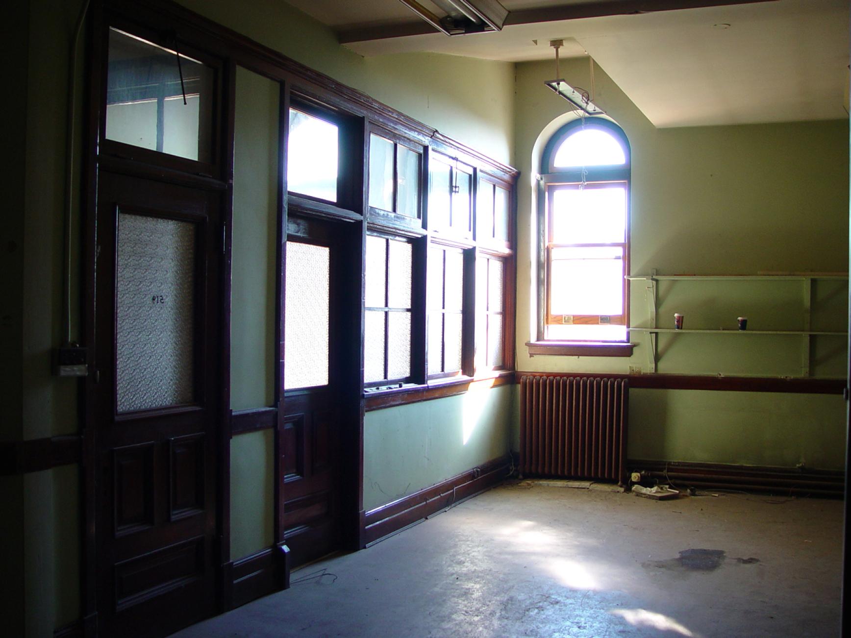 Picture of old office in west attic prior to renovation.