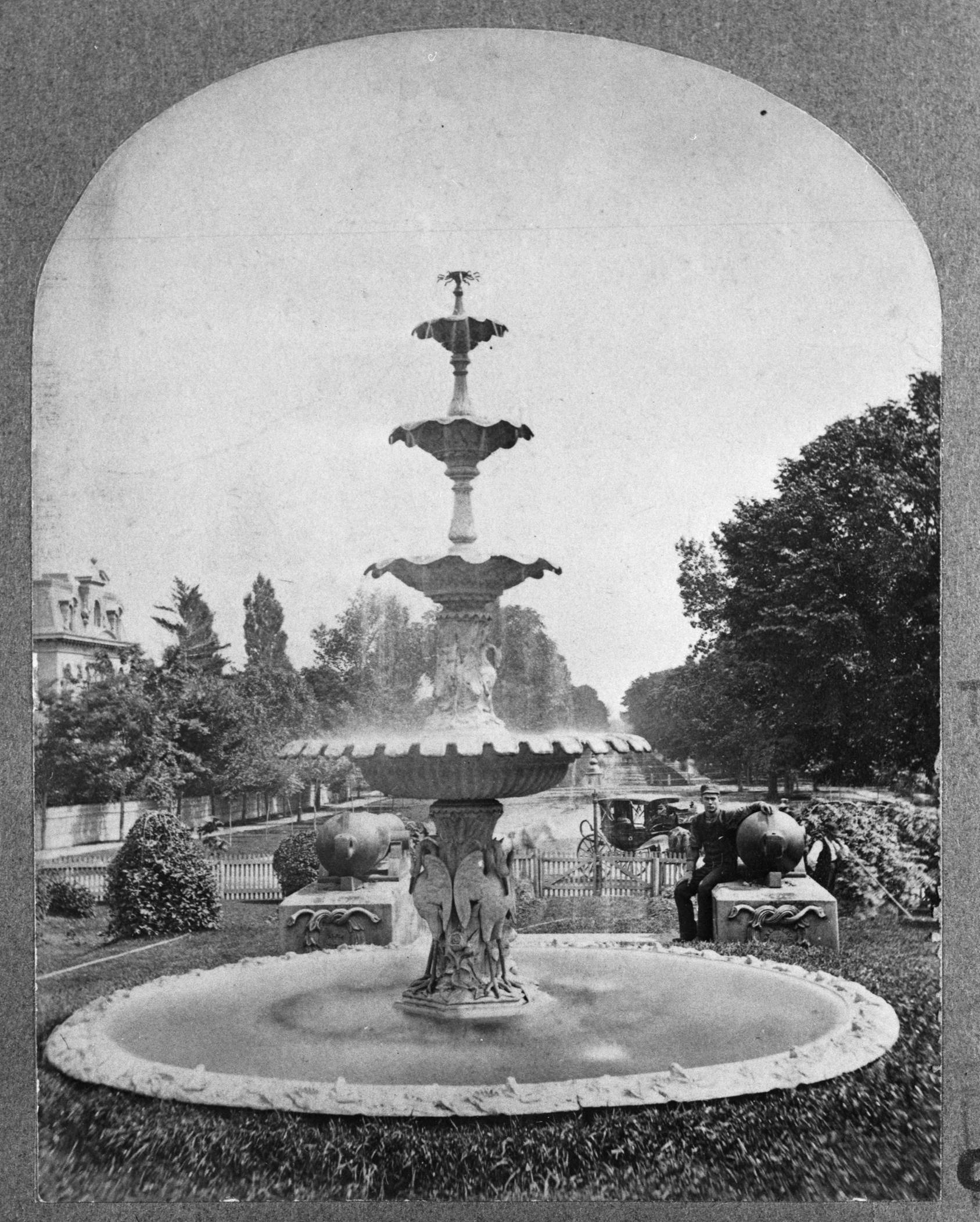 Fountain at the entrance of Queen's Park,circa 1880s.