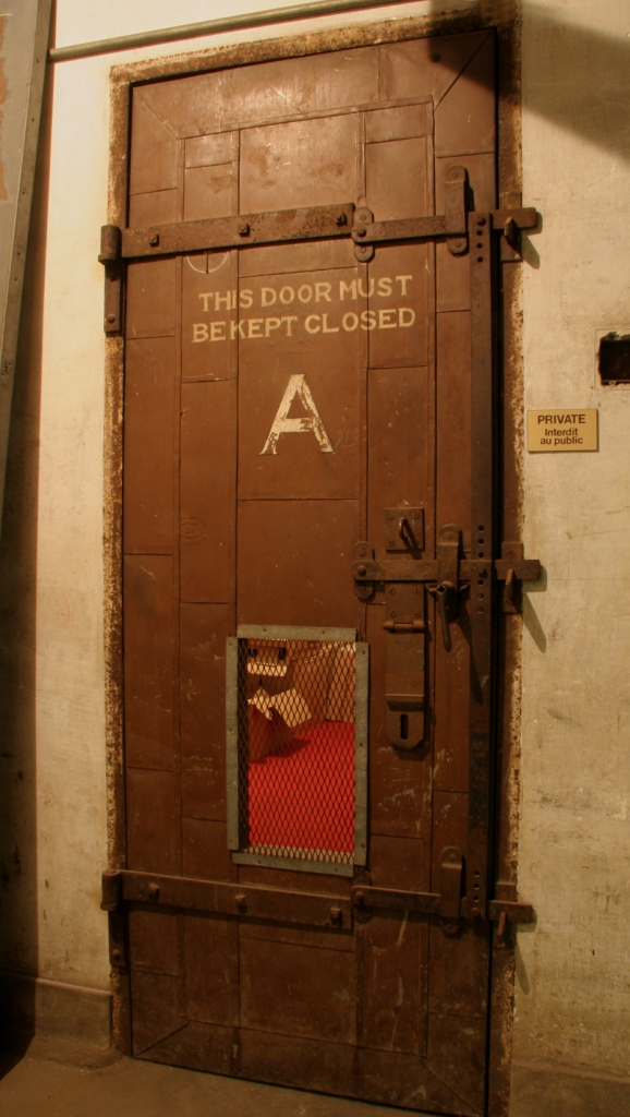 Picture of metal door to a vault in the film bunker.