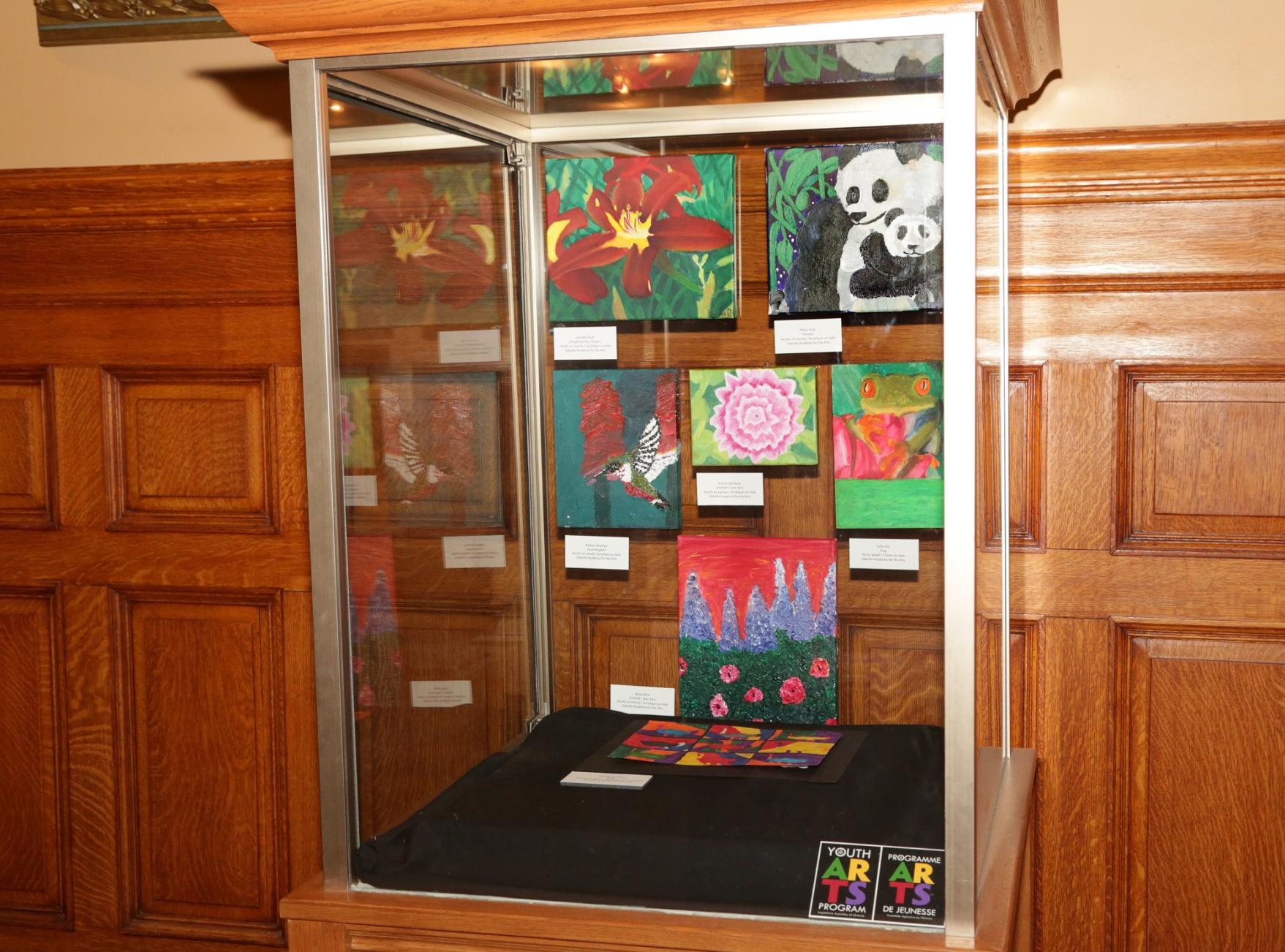Paintings by student artists in the 2013 Youth Arts Program.