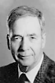 A headshot of Charles Murray Tatham