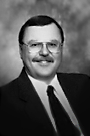 A headshot of Frank R. Miclash