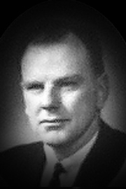 A headshot of George A. Kerr.