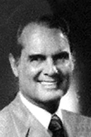 A headshot of Gordon Carton