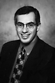 A headshot of Tony Clement