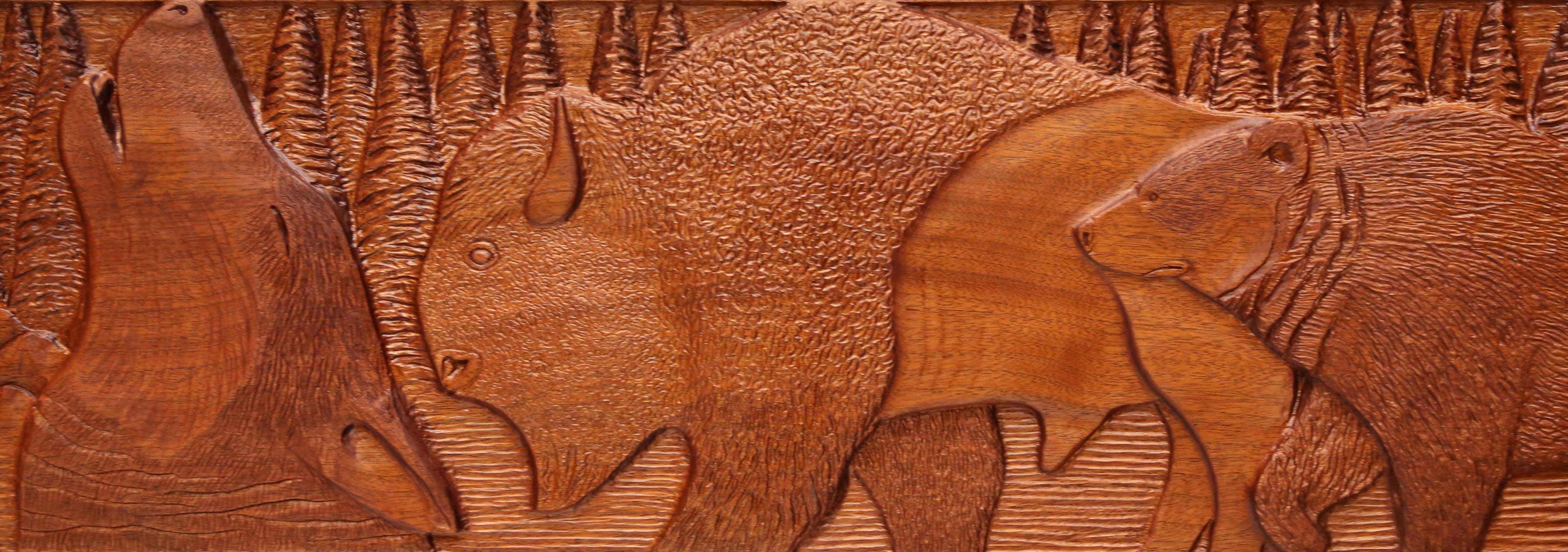 a detail from the Seven Sacred Teachings showing a wolf, a bison and a bear