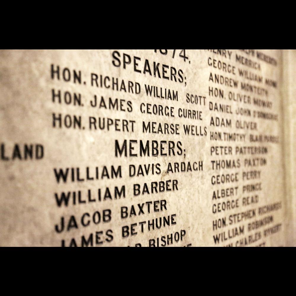 Carved names of MPPs on a marble wall