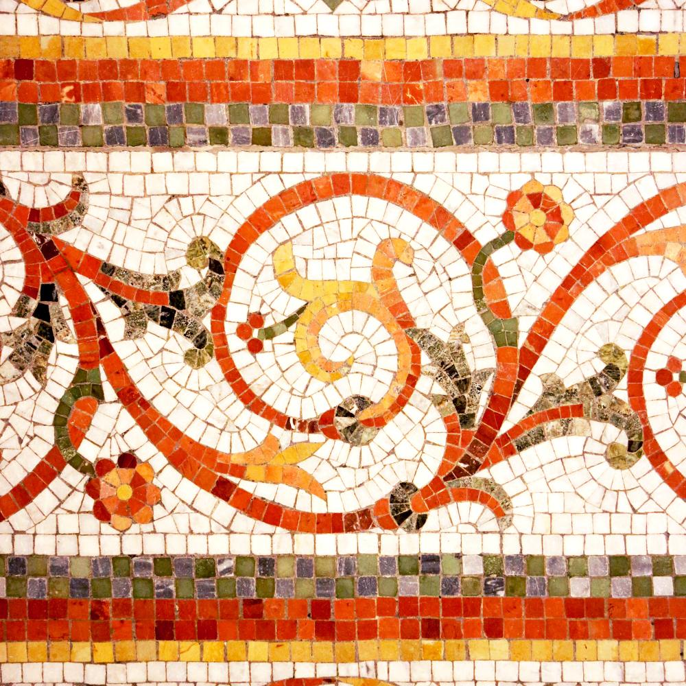 Picture of a section of the mosaic floor in the west wing of the Legislative Building