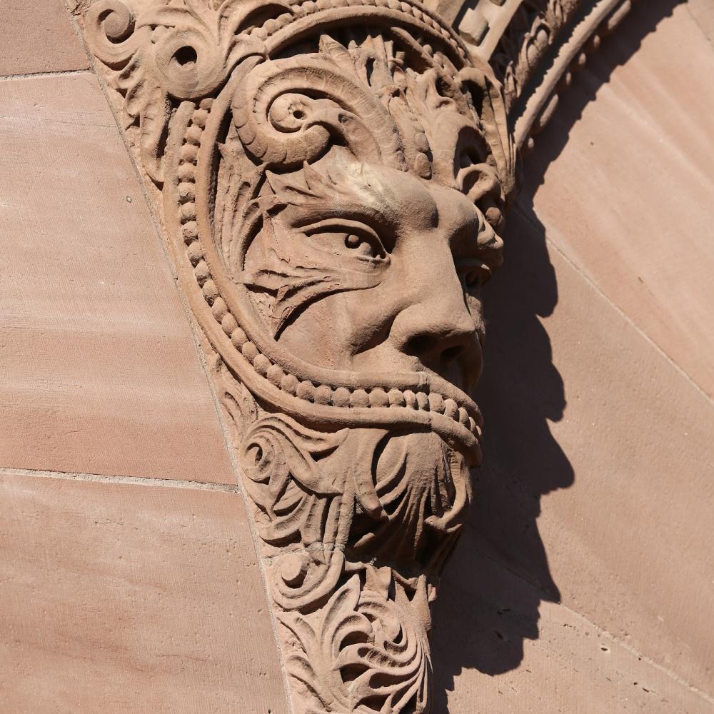 Picture of a sandstone carving on the Legislative Building exterior