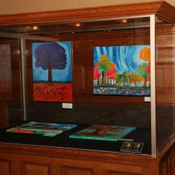 Paintings by student artists in the 2014 Youth Arts Program