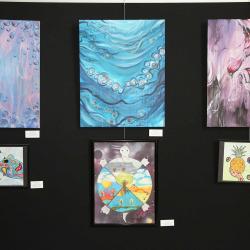Paintings by student artists in the 2014 Youth Arts Program